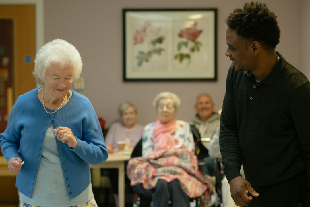 caregiver assisting senior with balance caregiver assisting senior with balance
