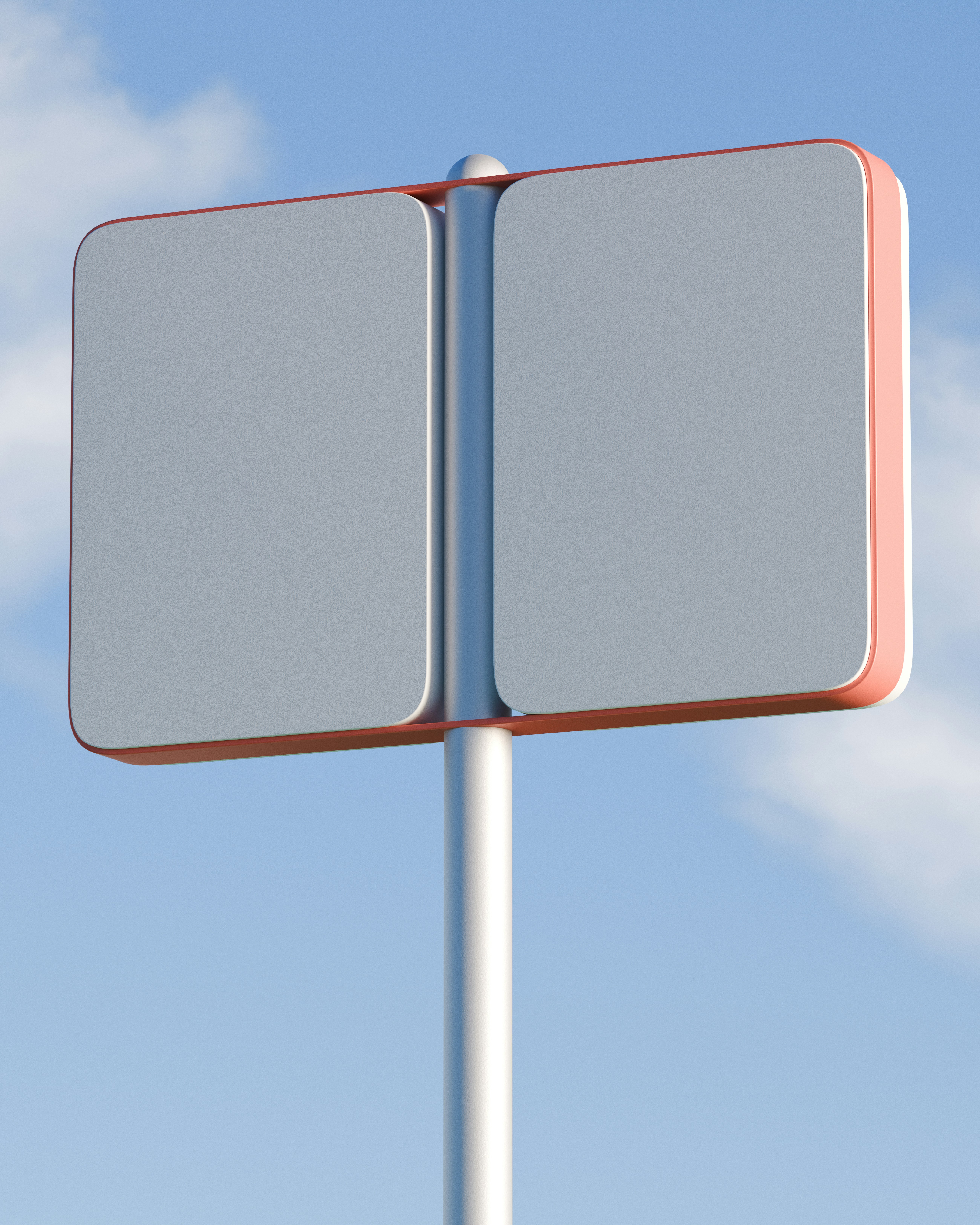 Two blank signs on a pole against a blue sky