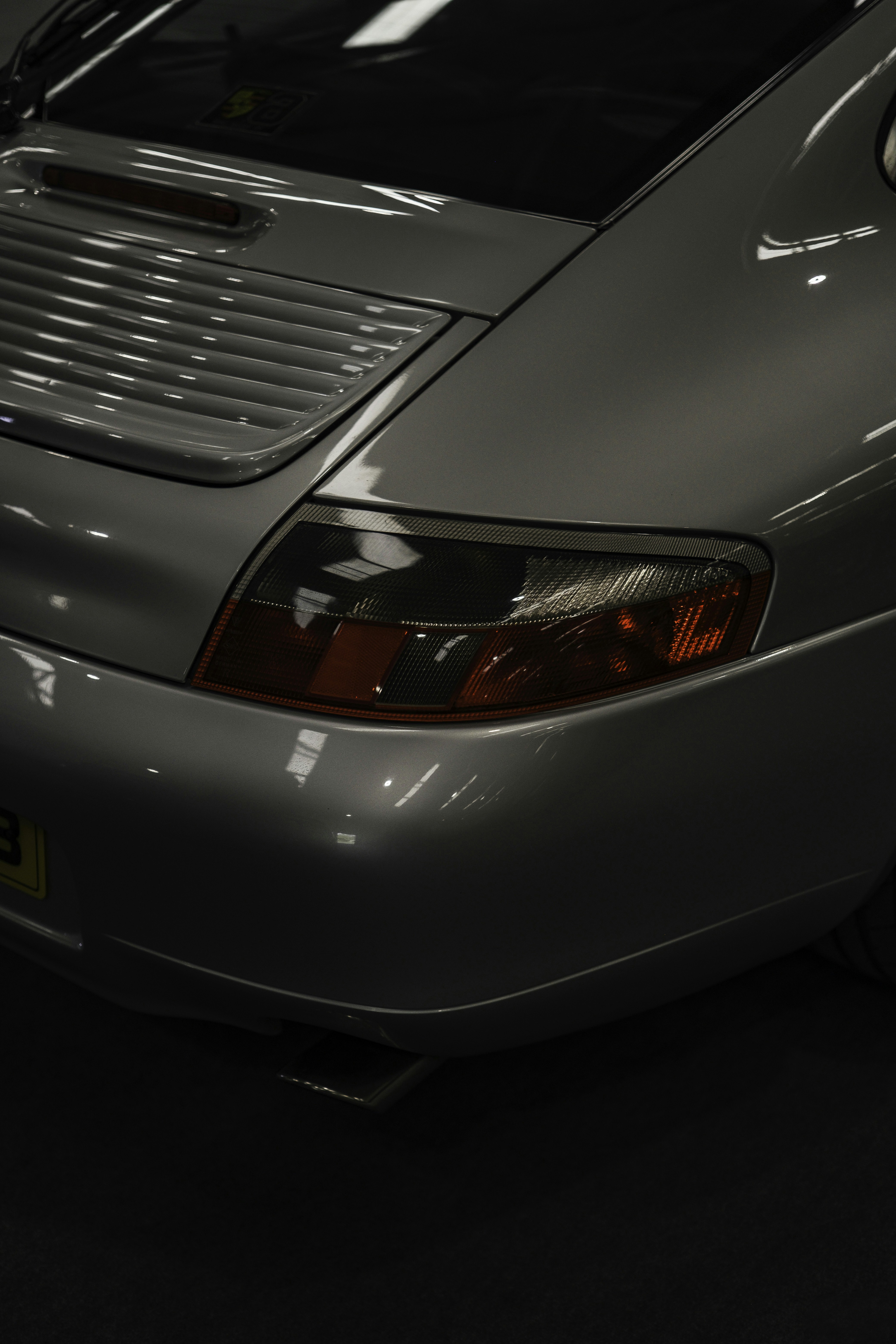 Close-up of a silver sports car's taillight
