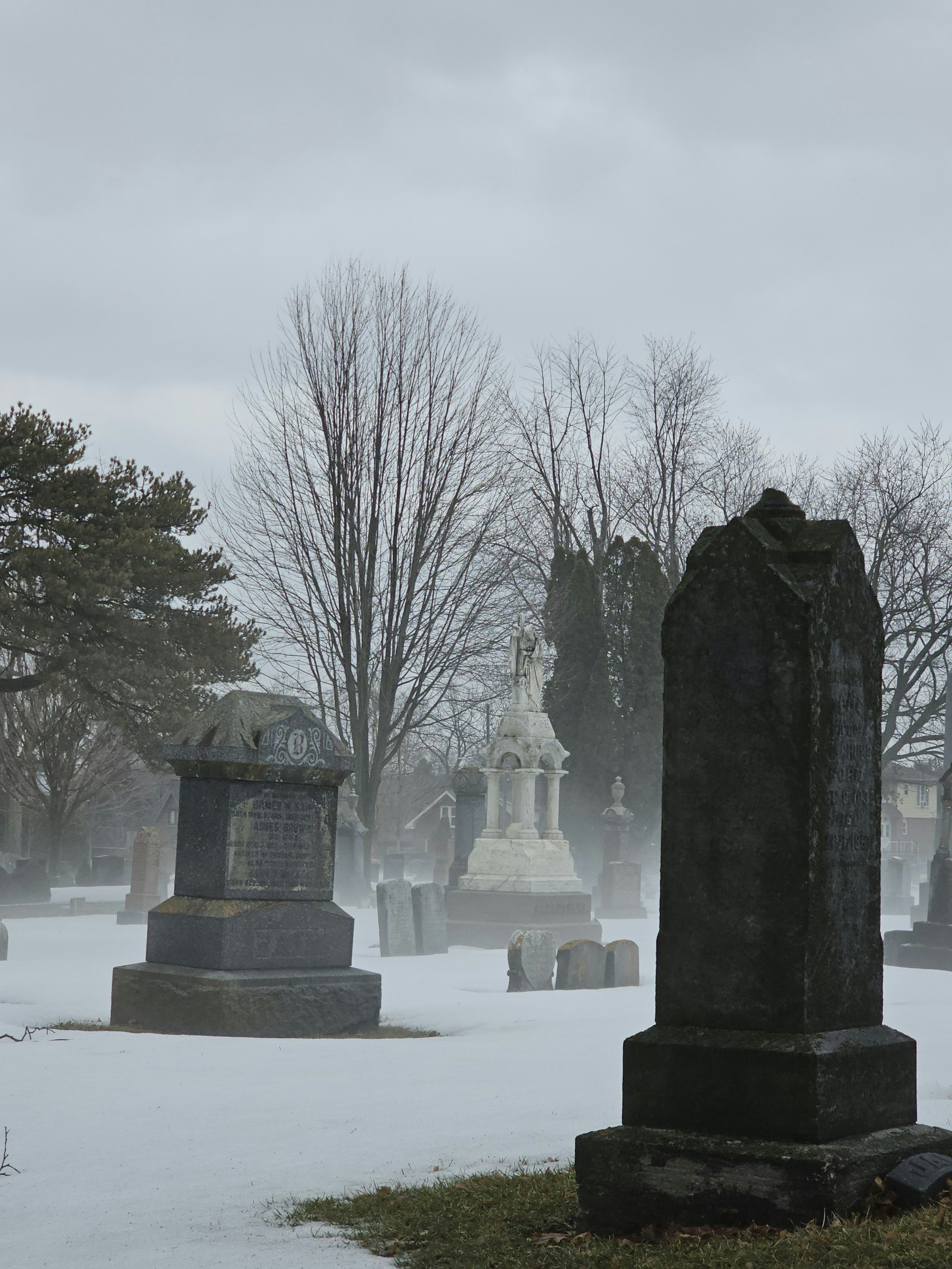 Whitby cemetery with angelic oversight.