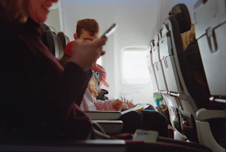 People traveling on an airplane during daytime