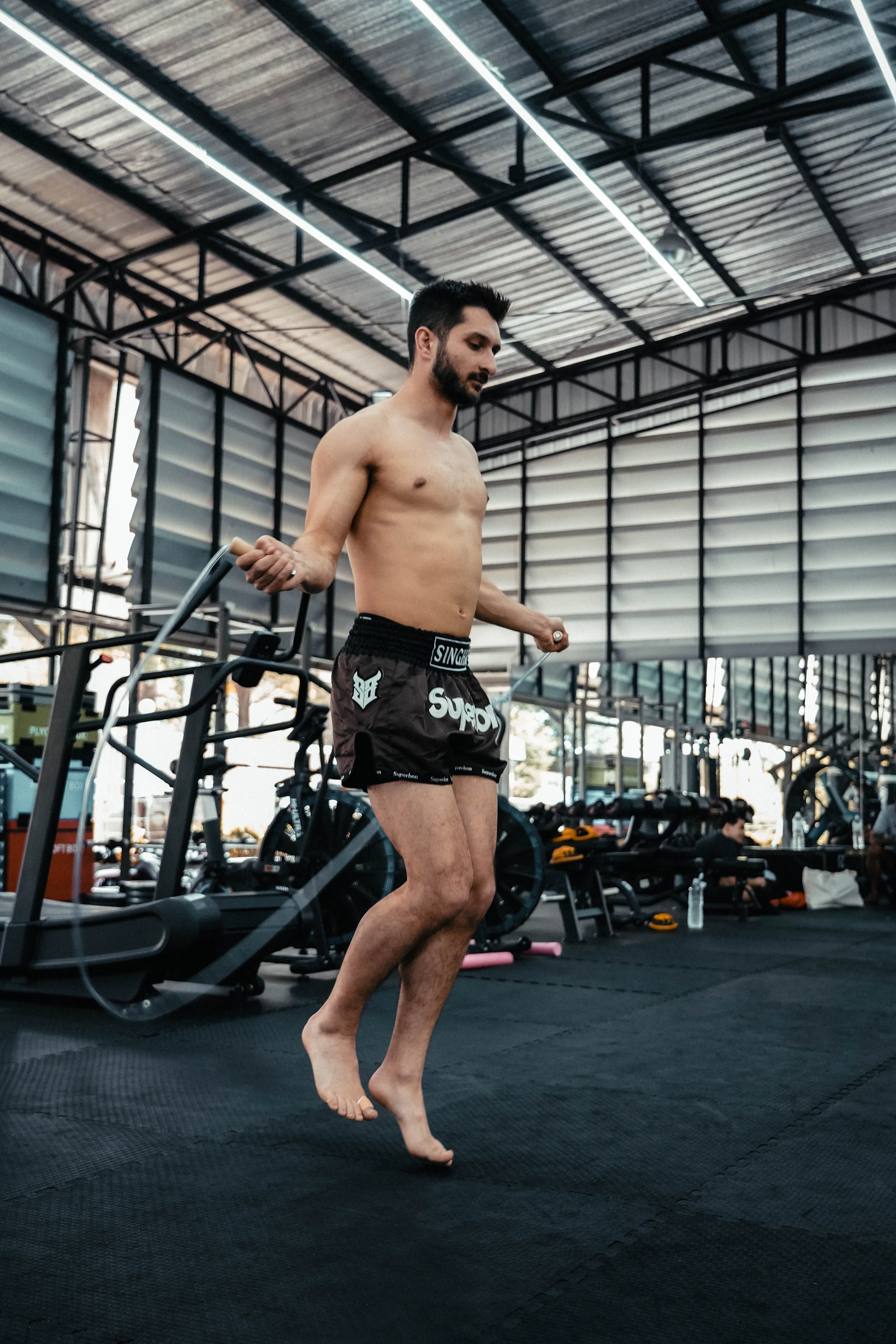 A fighter skipping rope during training