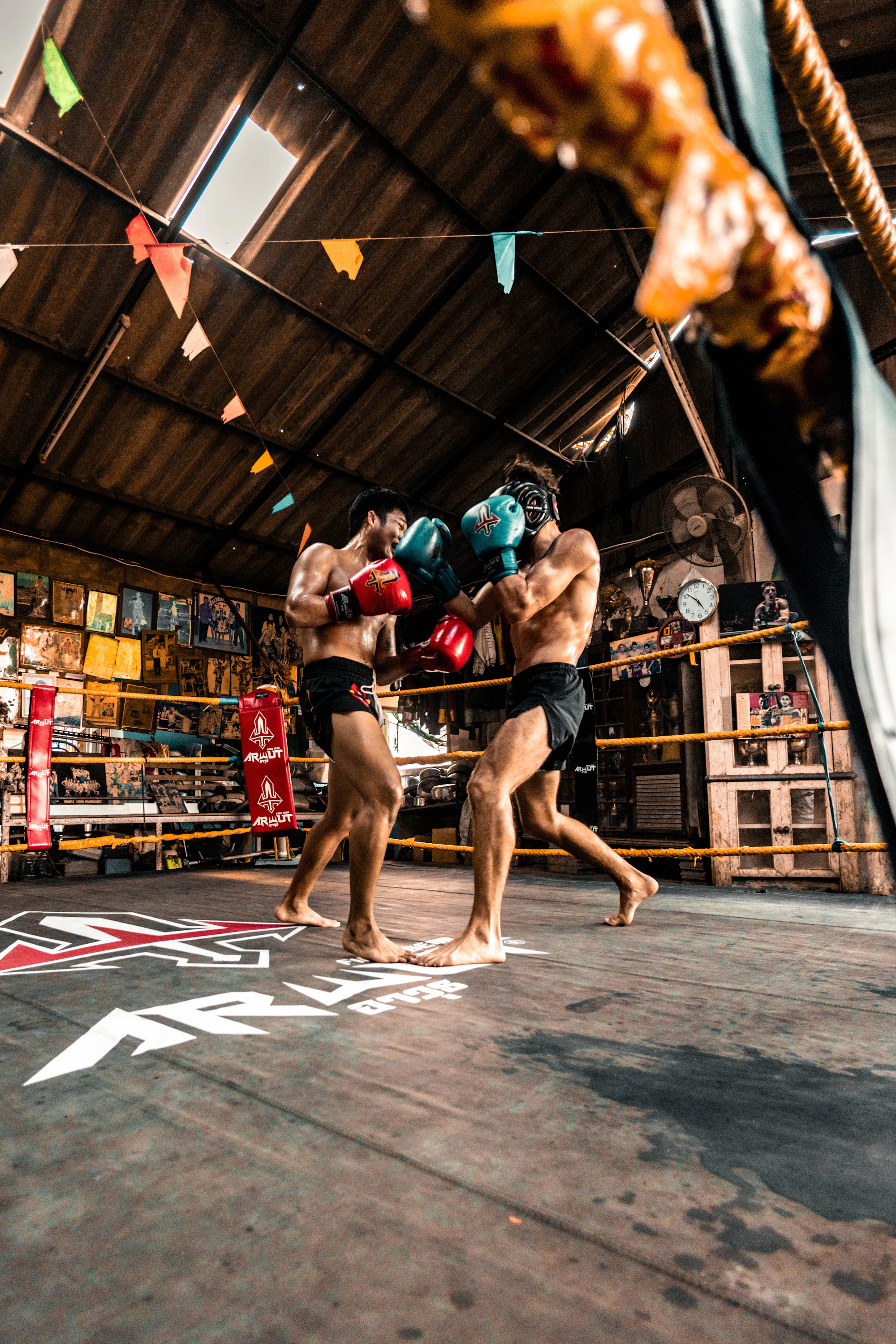 Two fighters sparring intensely in a ring