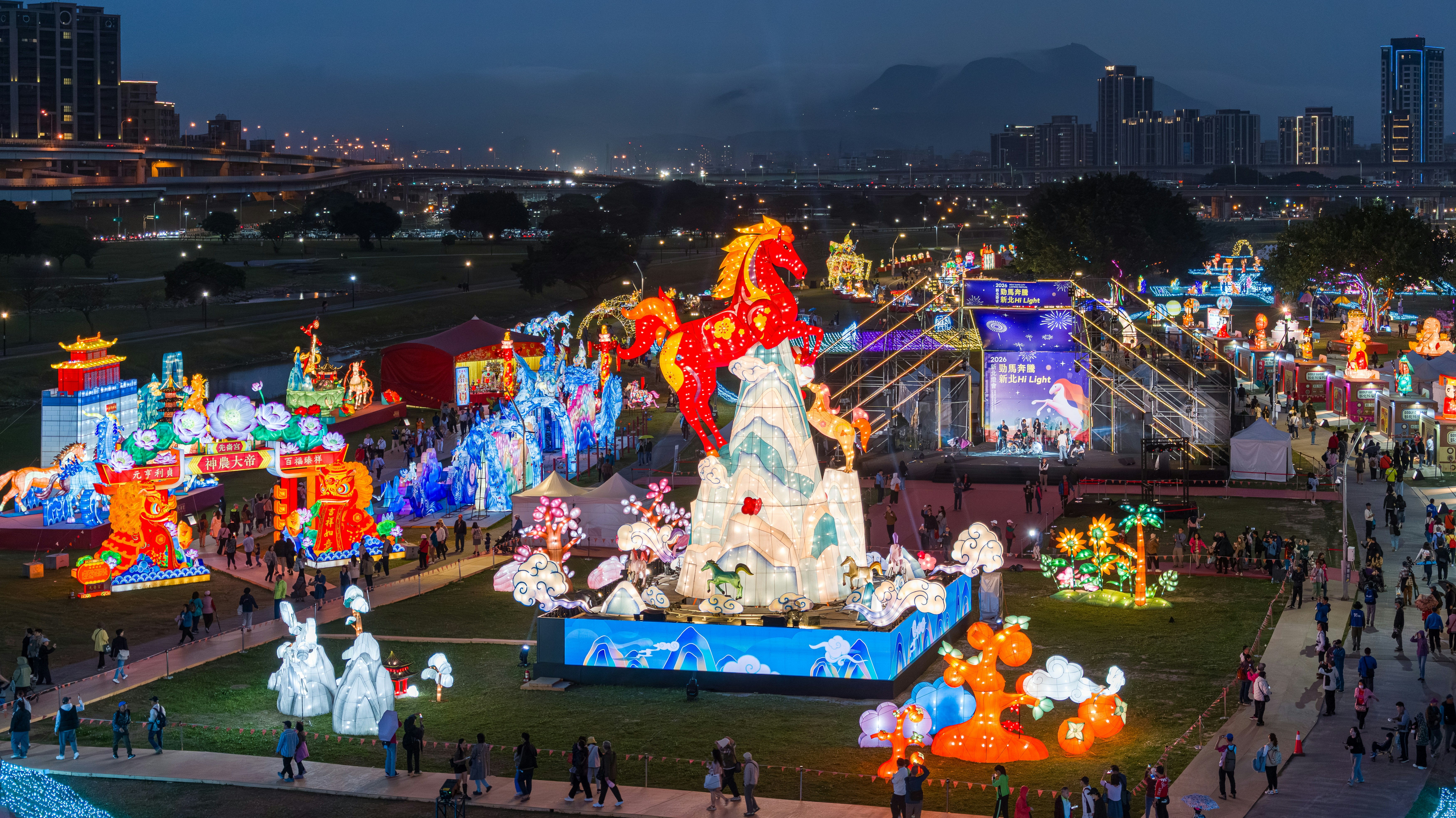 Colorful illuminated lanterns displayed at a nighttime festival