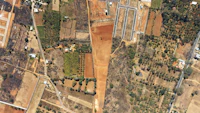 Aerial view of farmland and new development plots