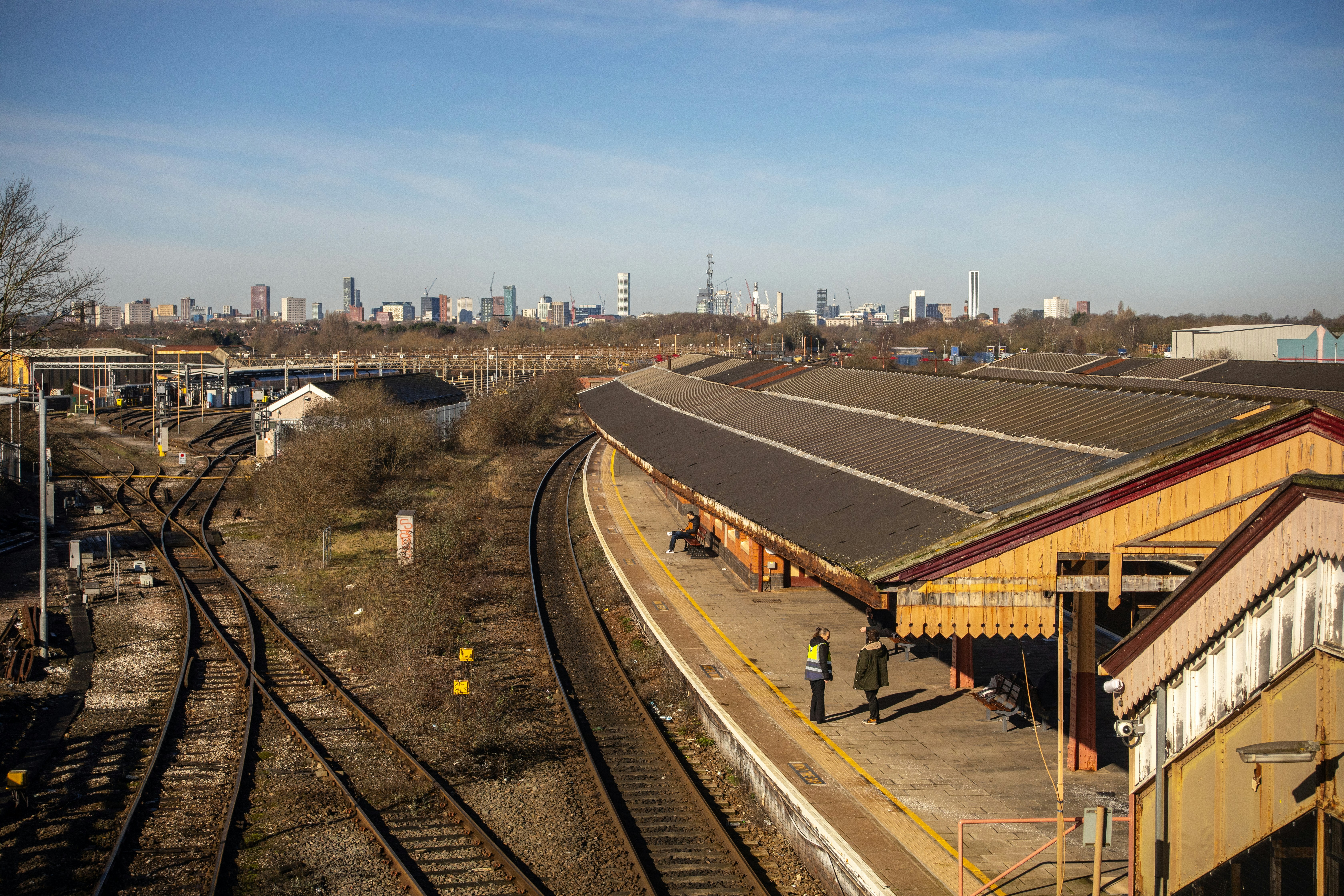 Train station with city skyline in the distance