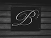 A stylized b3 logo on a wooden wall