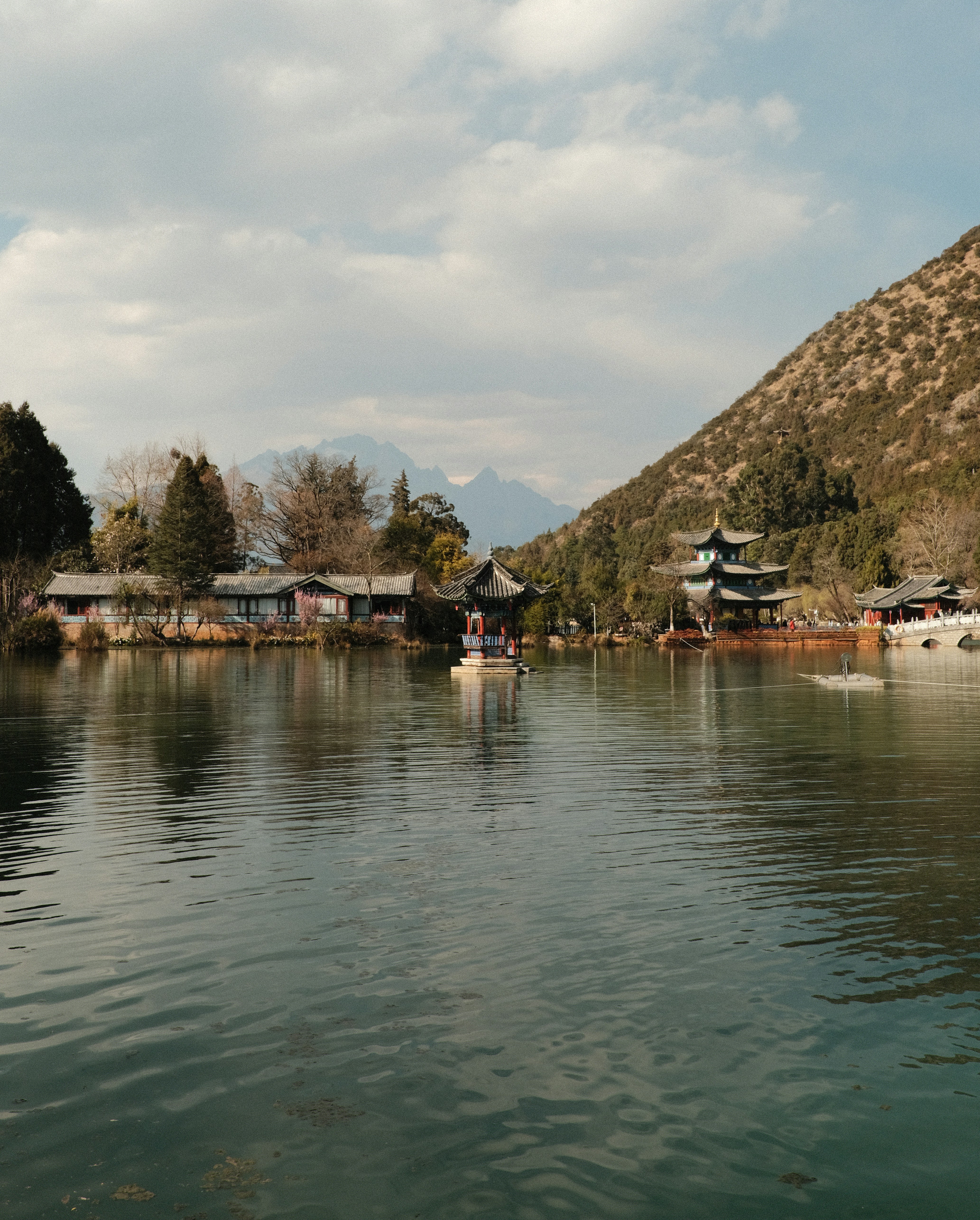 Traditional chinese architecture by a tranquil lake