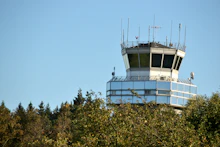 An air traffic control tower at an airport