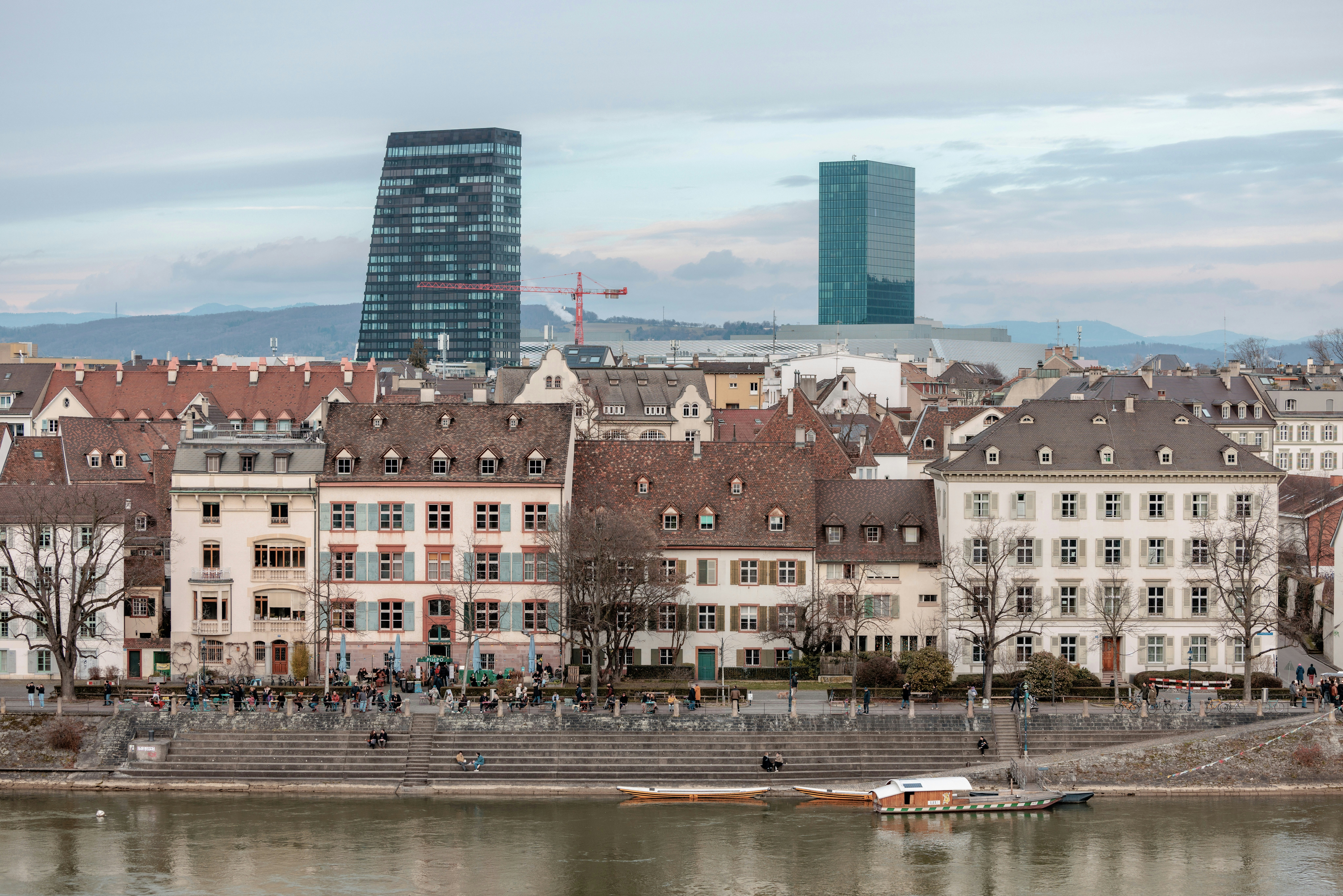 City skyline with historic buildings and modern towers.