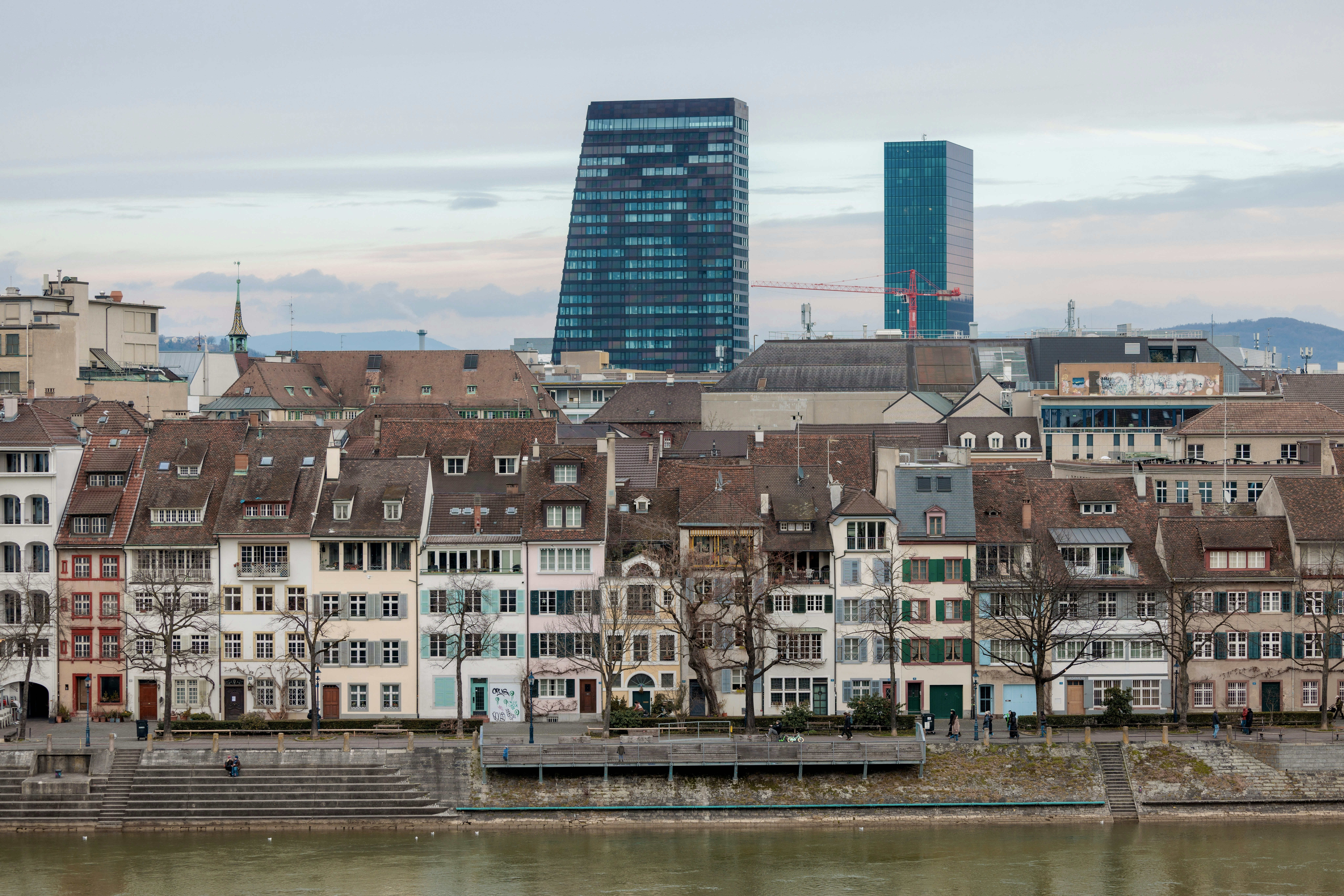 Modern skyscrapers behind old european buildings
