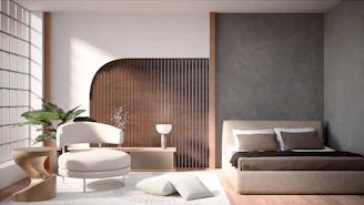 Modern bedroom with a bed and armchair