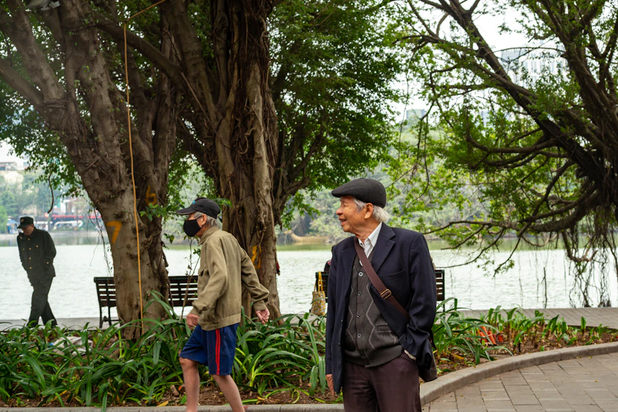 A man walking by a lake
