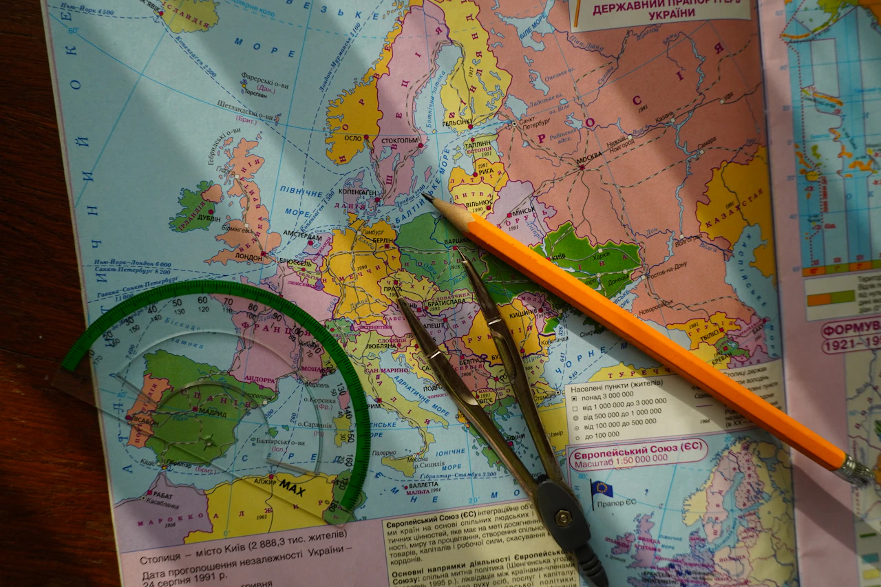 Map of Europe with drawing tools and a pencil