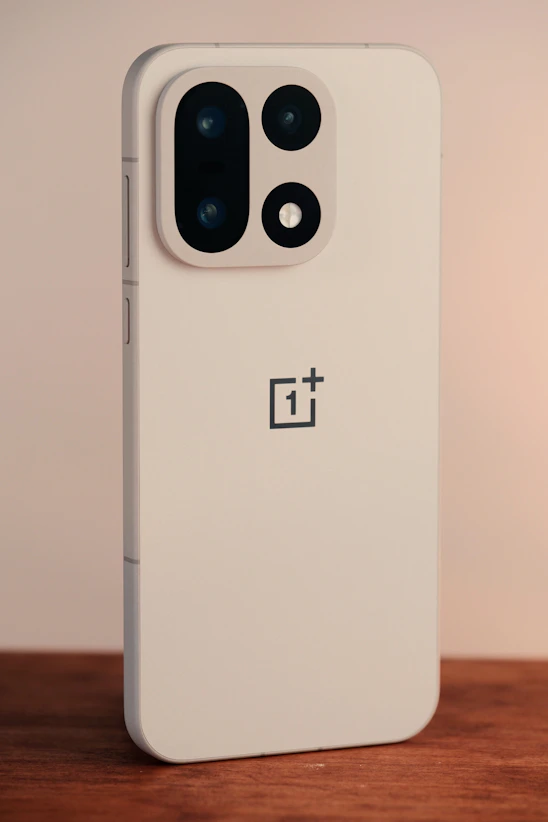 A white smartphone with a distinctive camera module.