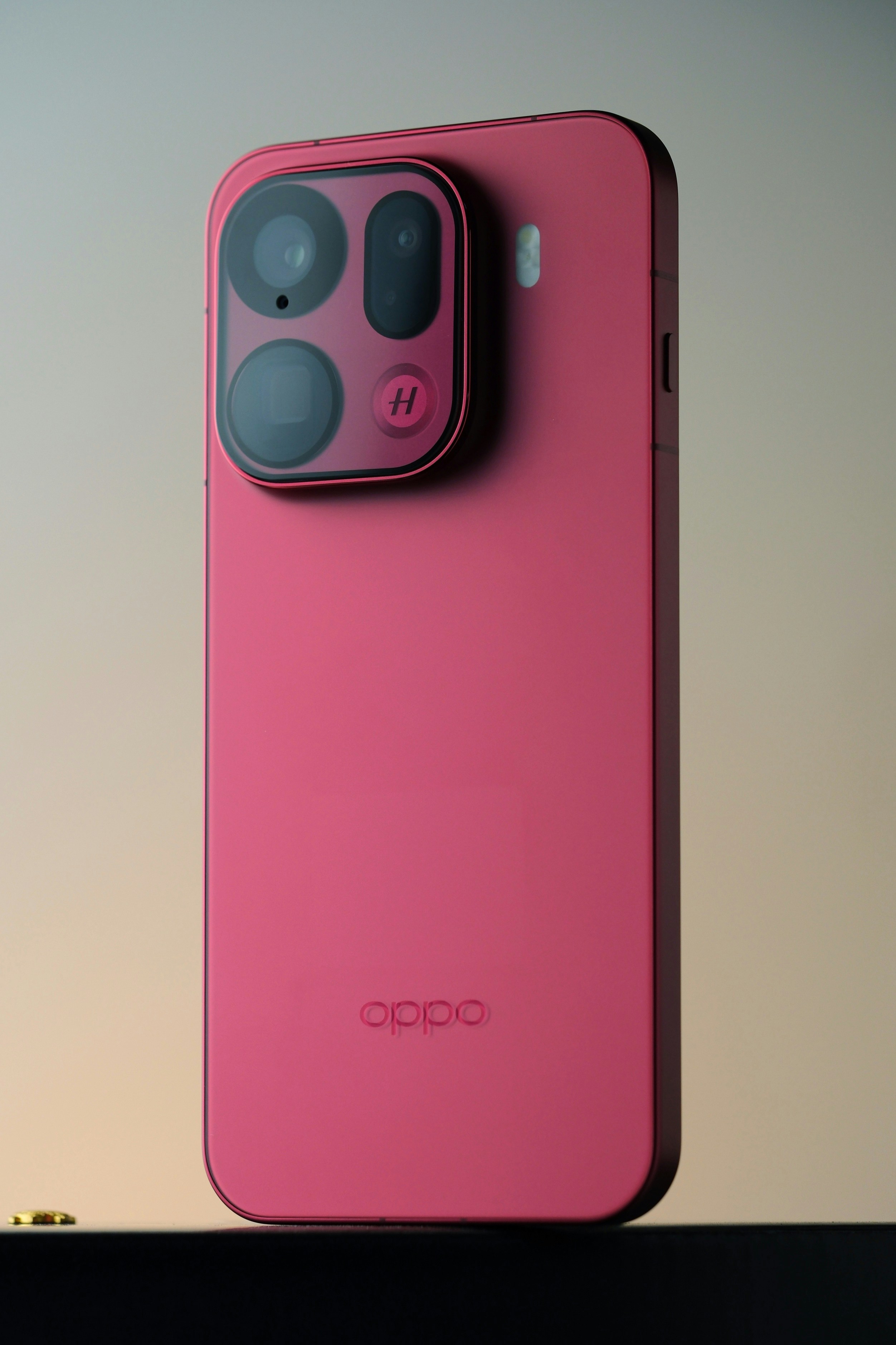 Red smartphone with a distinctive camera module