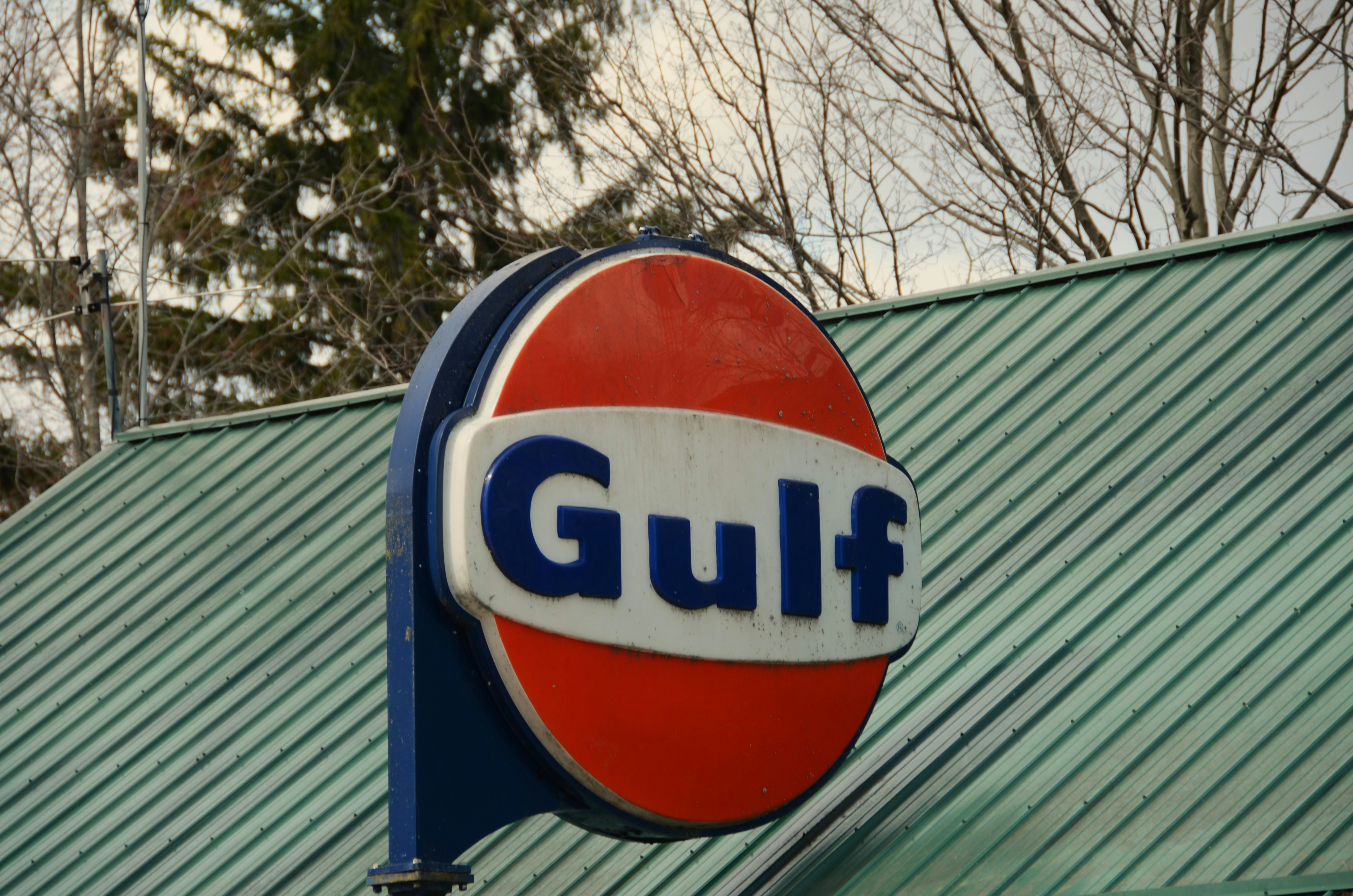 Gulf gas station sign on a green roof