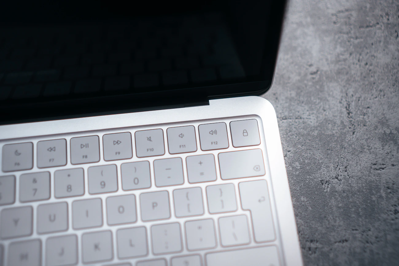 Close view of a modern laptop keyboard and screen representing accessible digital content