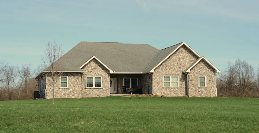 Beautifully maintained stone ranch home on a sunny day