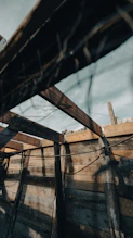 Wooden structure under a cloudy sky