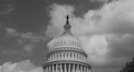 The united states capitol building dome against a cloudy sky