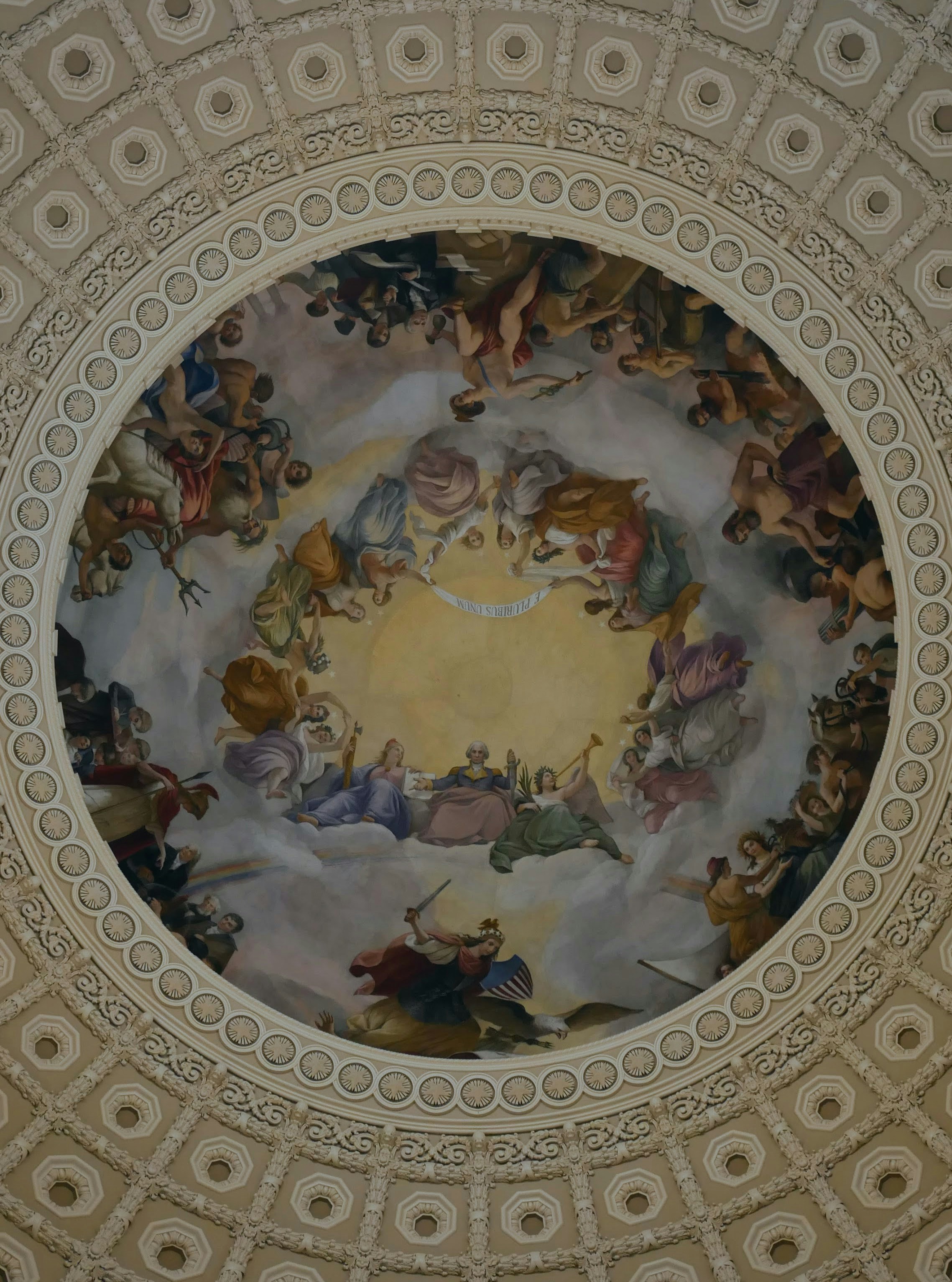 Ornate ceiling fresco with mythological figures in clouds