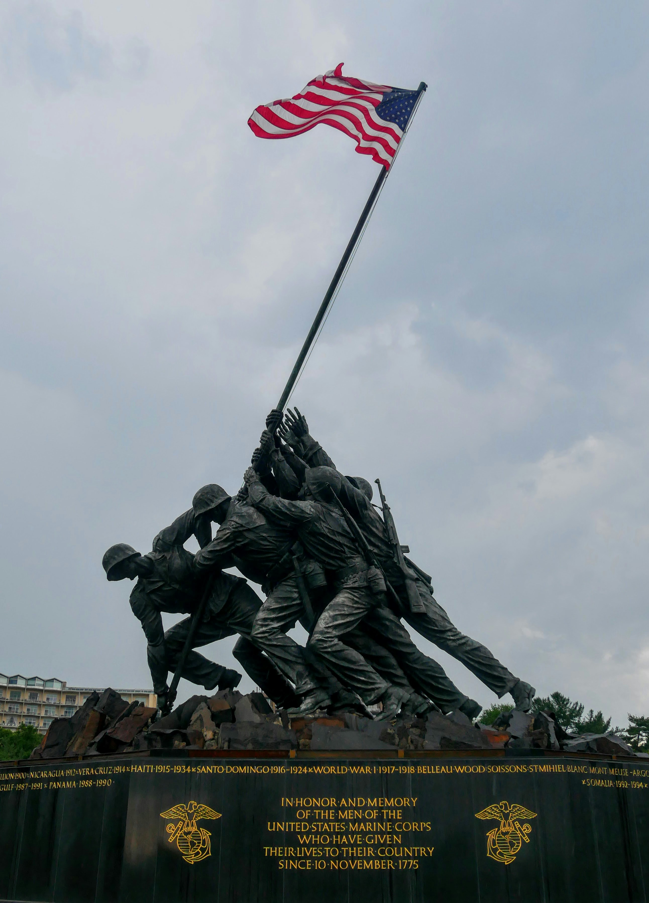 Iwo jima memorial with american flag waving