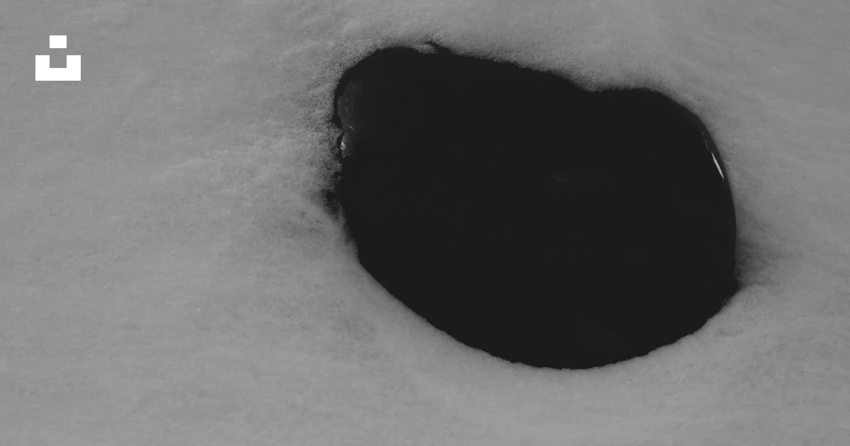 Snow Puddle Texture A dark puddle in the snow photo – Free Abstract Image on Unsplash