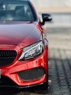 Close-up of a shiny red luxury car