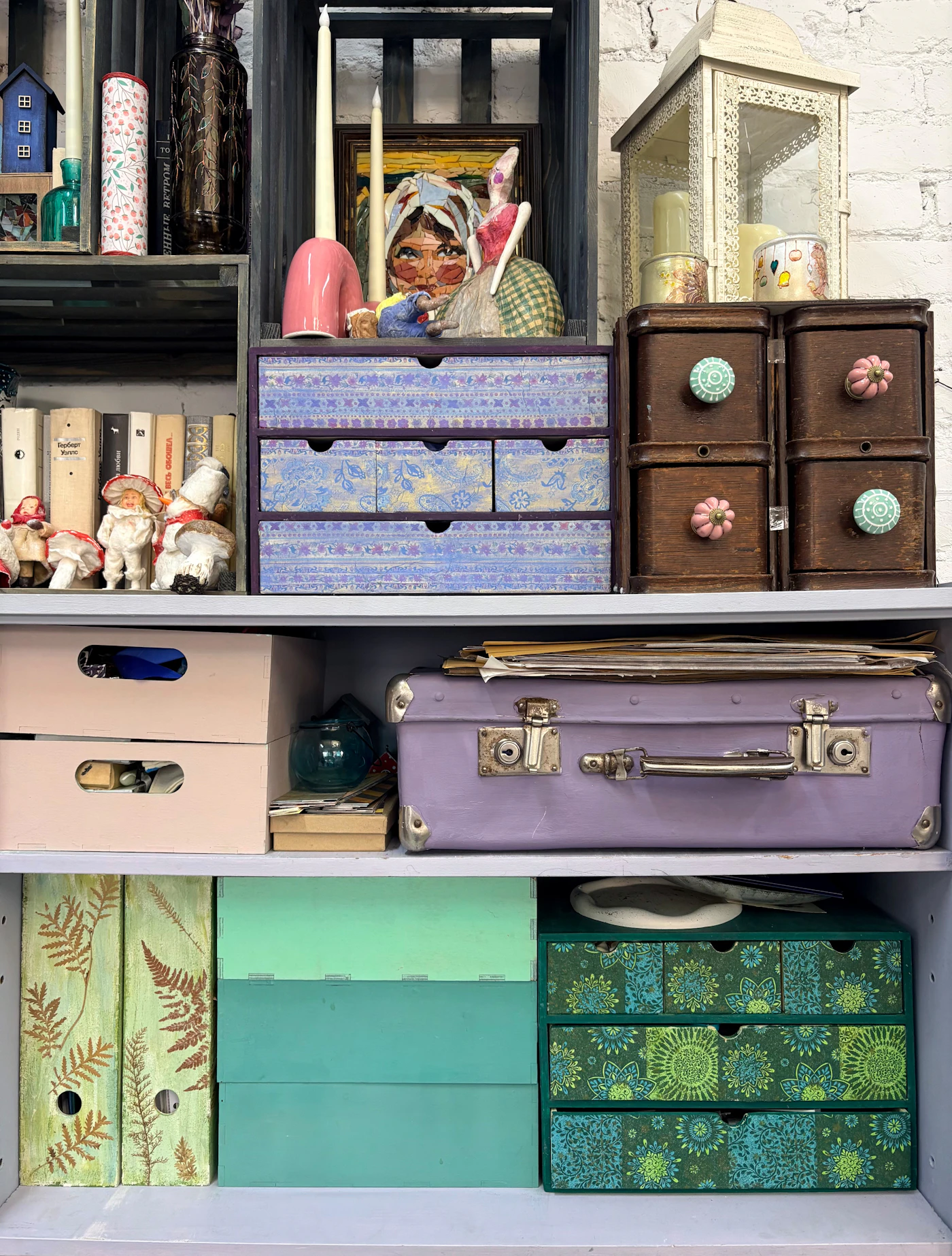 Colorful storage boxes, drawers, and keepsakes arranged on shelves