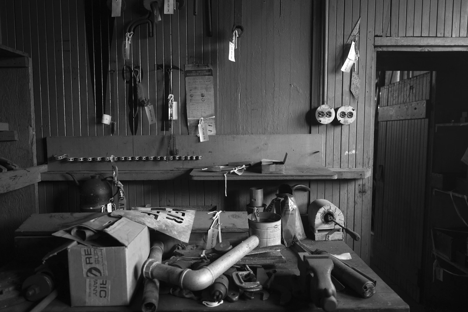Traditional industrial workshop workbench with repair tools and equipment