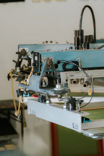 Close-up of a screen printing machine in a workshop