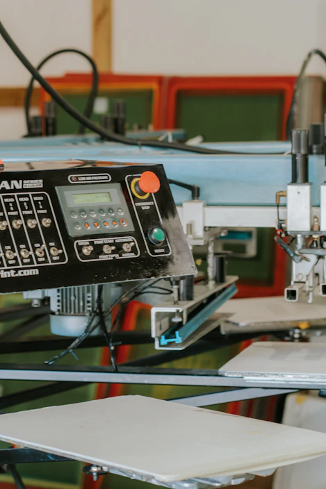 Close up of a screen printing machine control panel