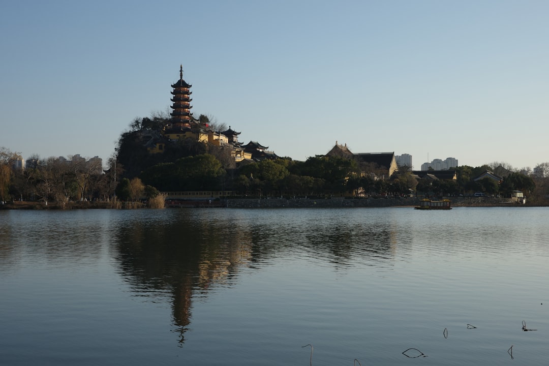 Pagoda reflected on the lake at sunset