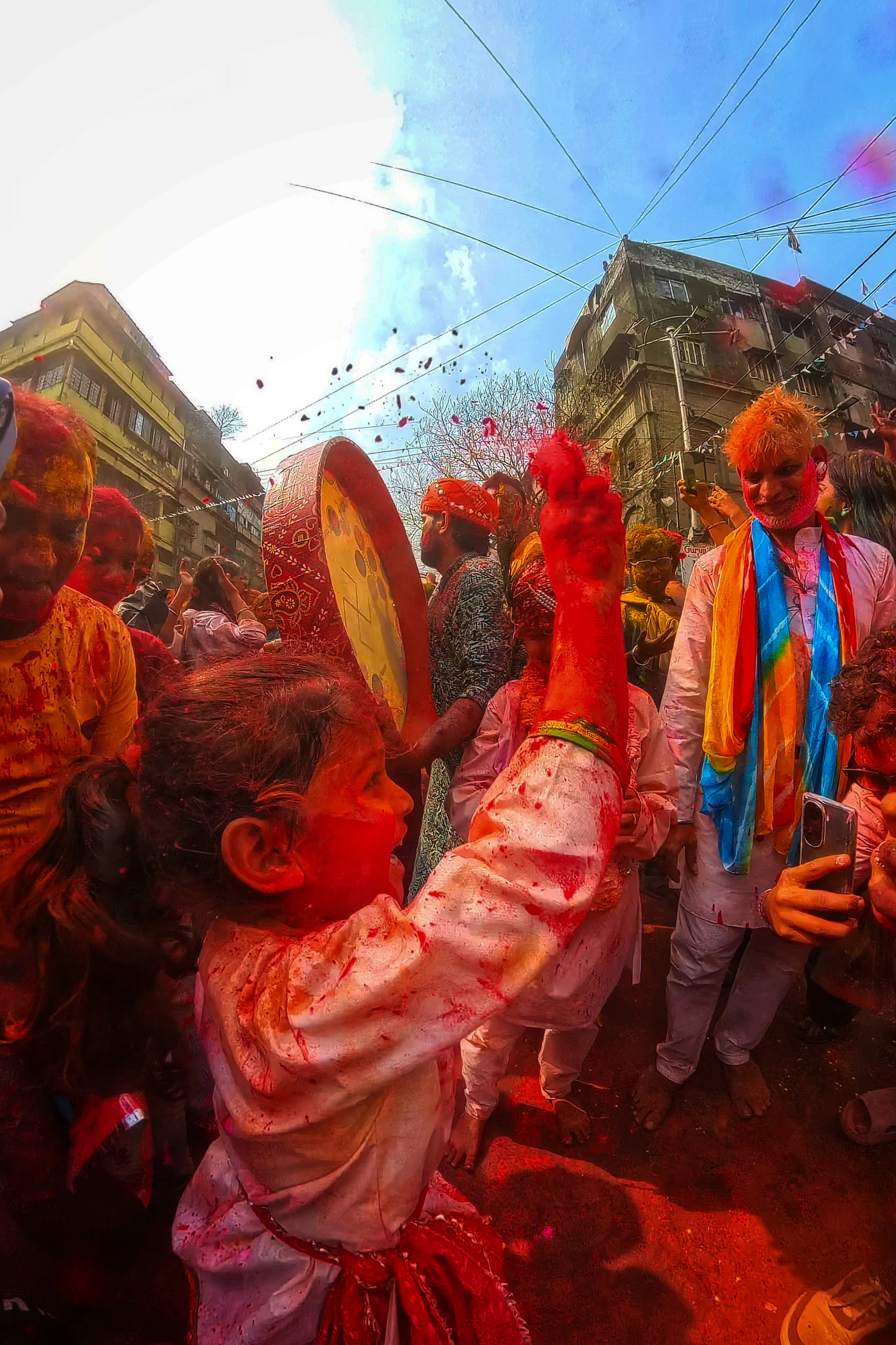 Children celebrate holi festival with colored powder