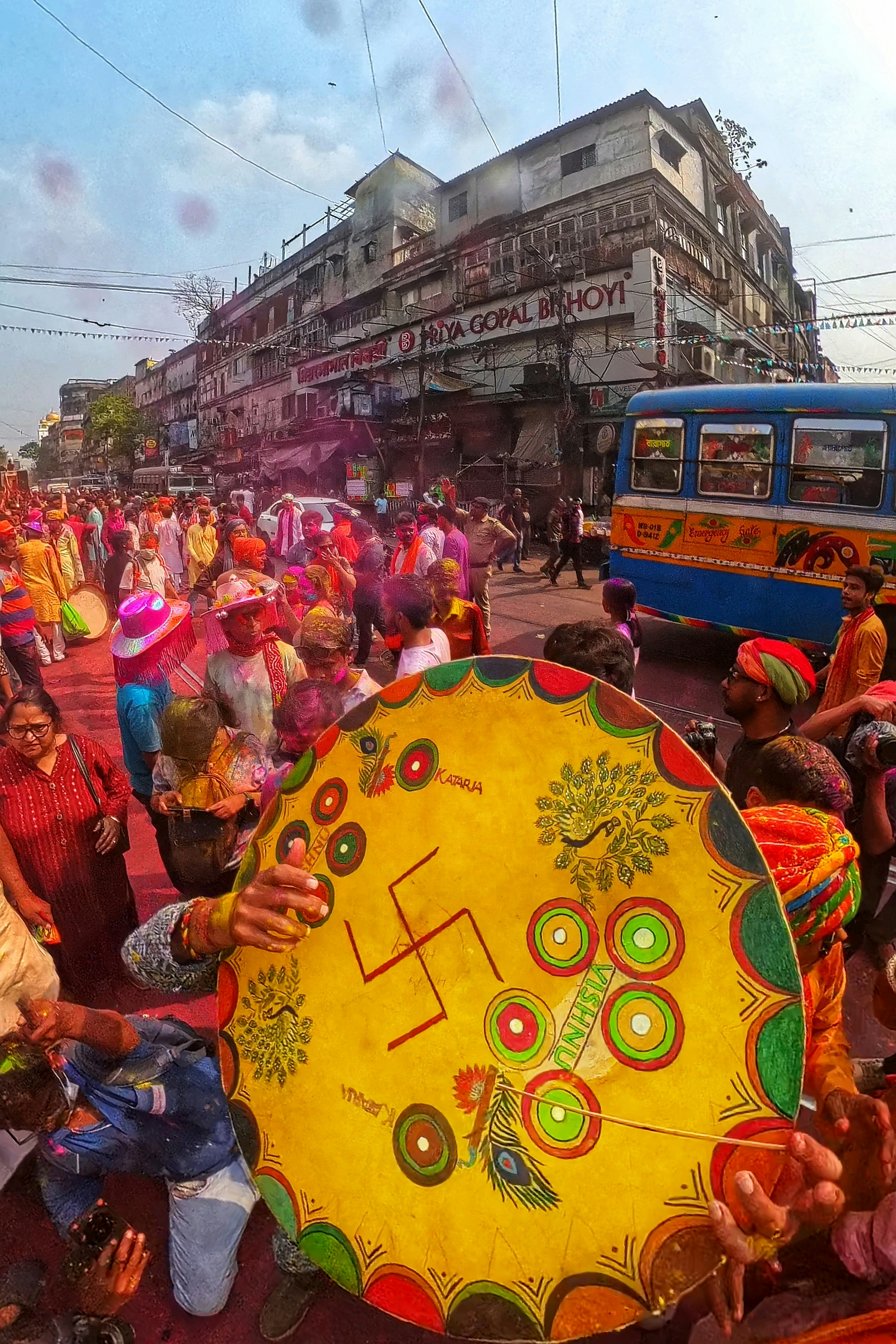 People celebrating holi festival in india with colors