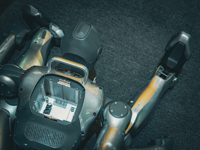 A robotic torso with exposed internal components and arms