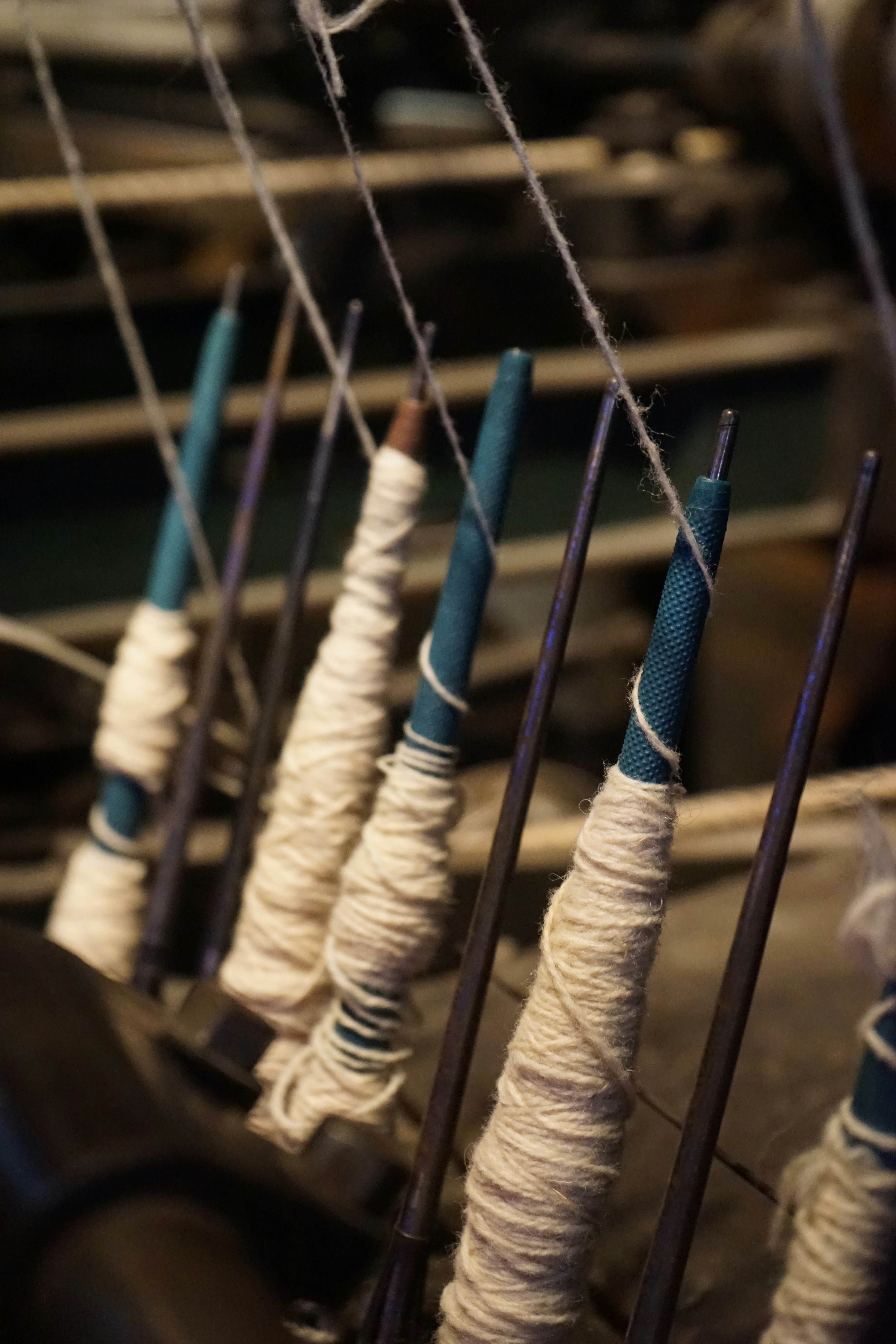 Spools of thread on a weaving machine