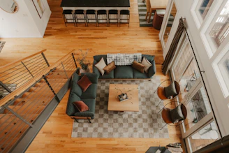 Spacious living room with modern furniture and wooden floors