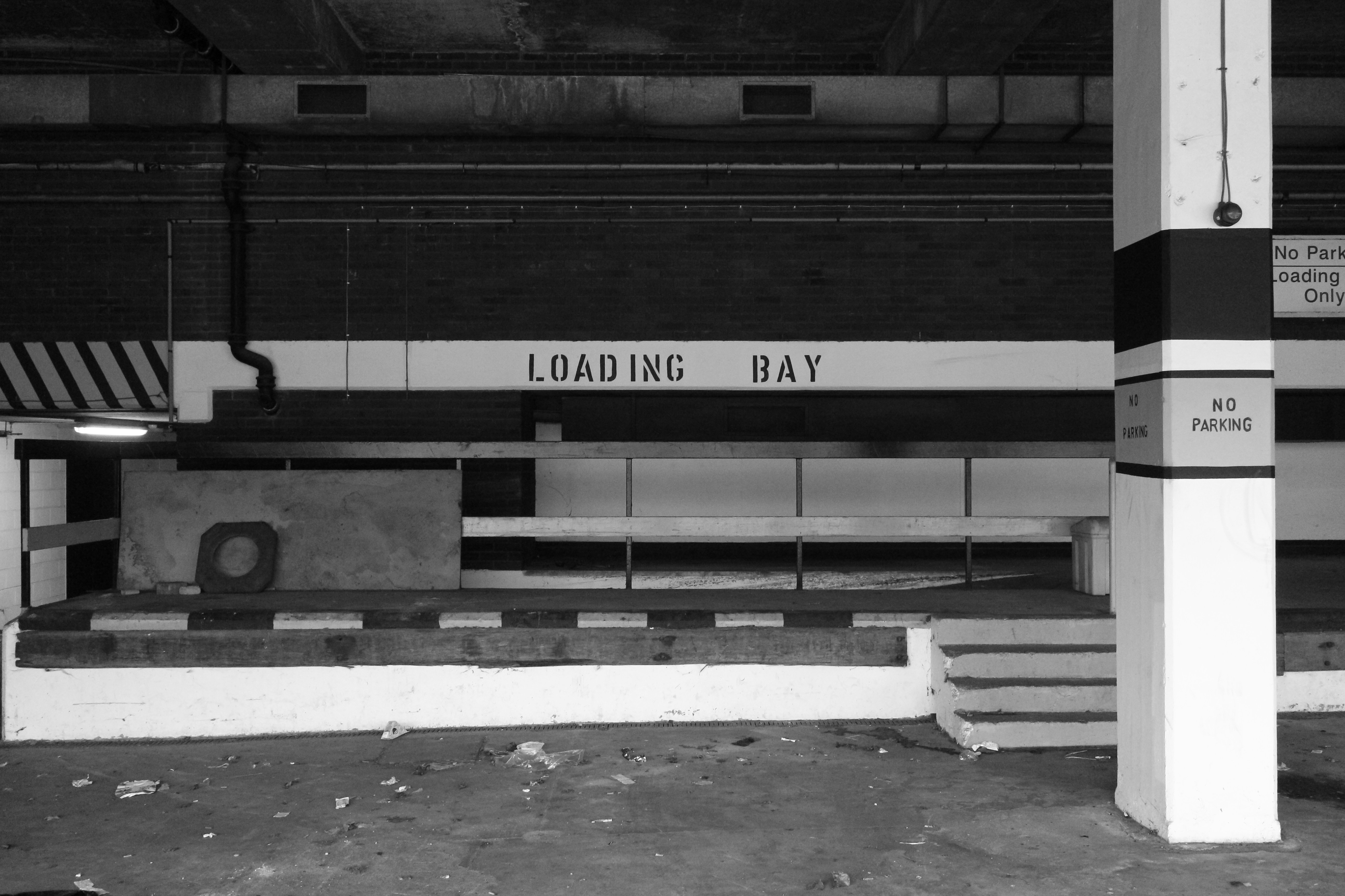 Loading bay area with stairs and pillar