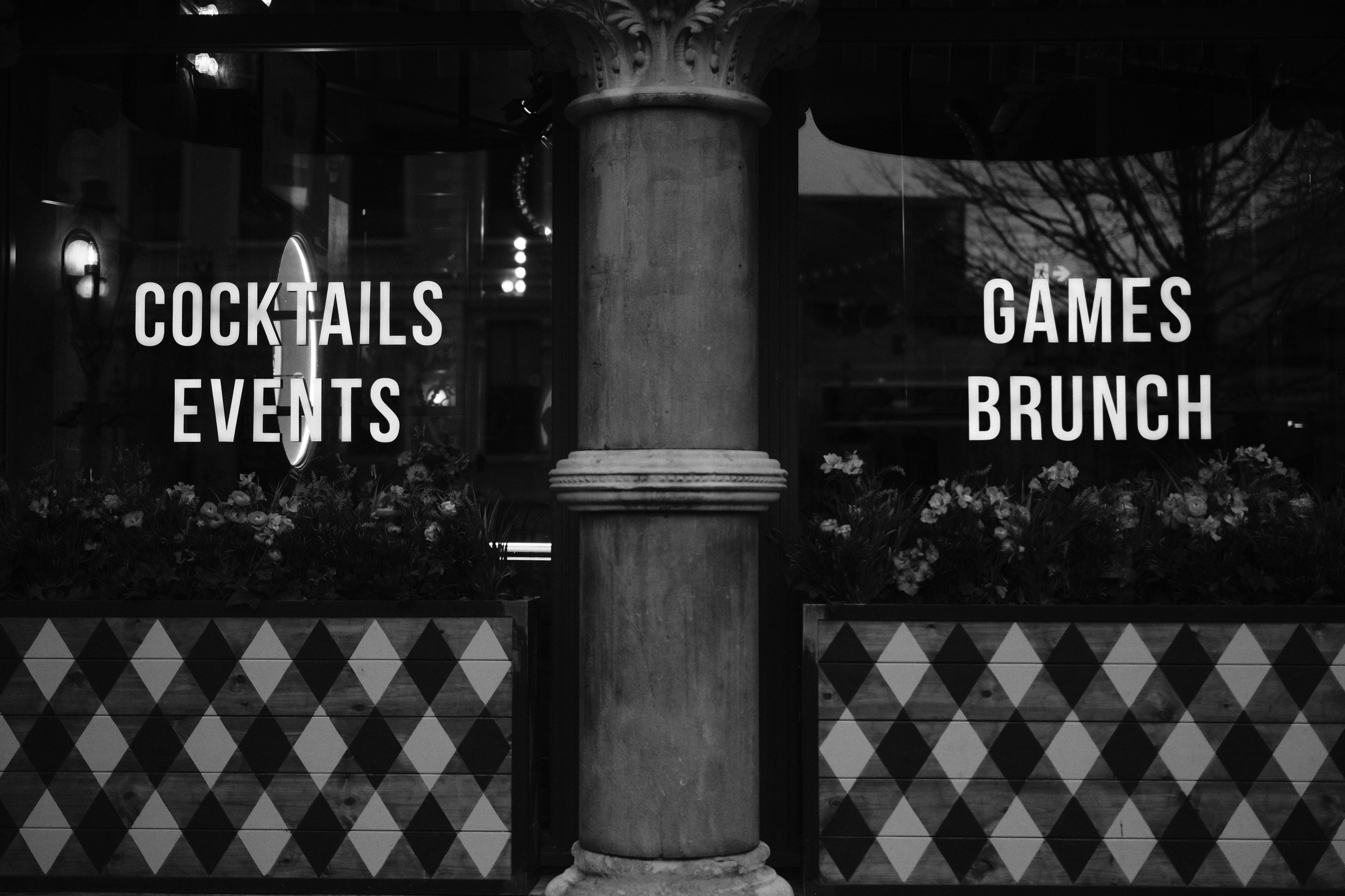 Cocktails, events, games, and brunch advertised.