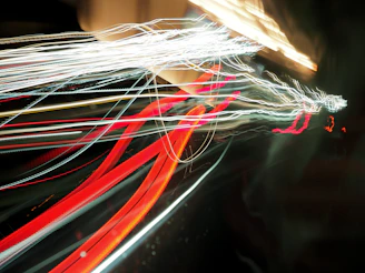 Abstract streaks of red and white light at night