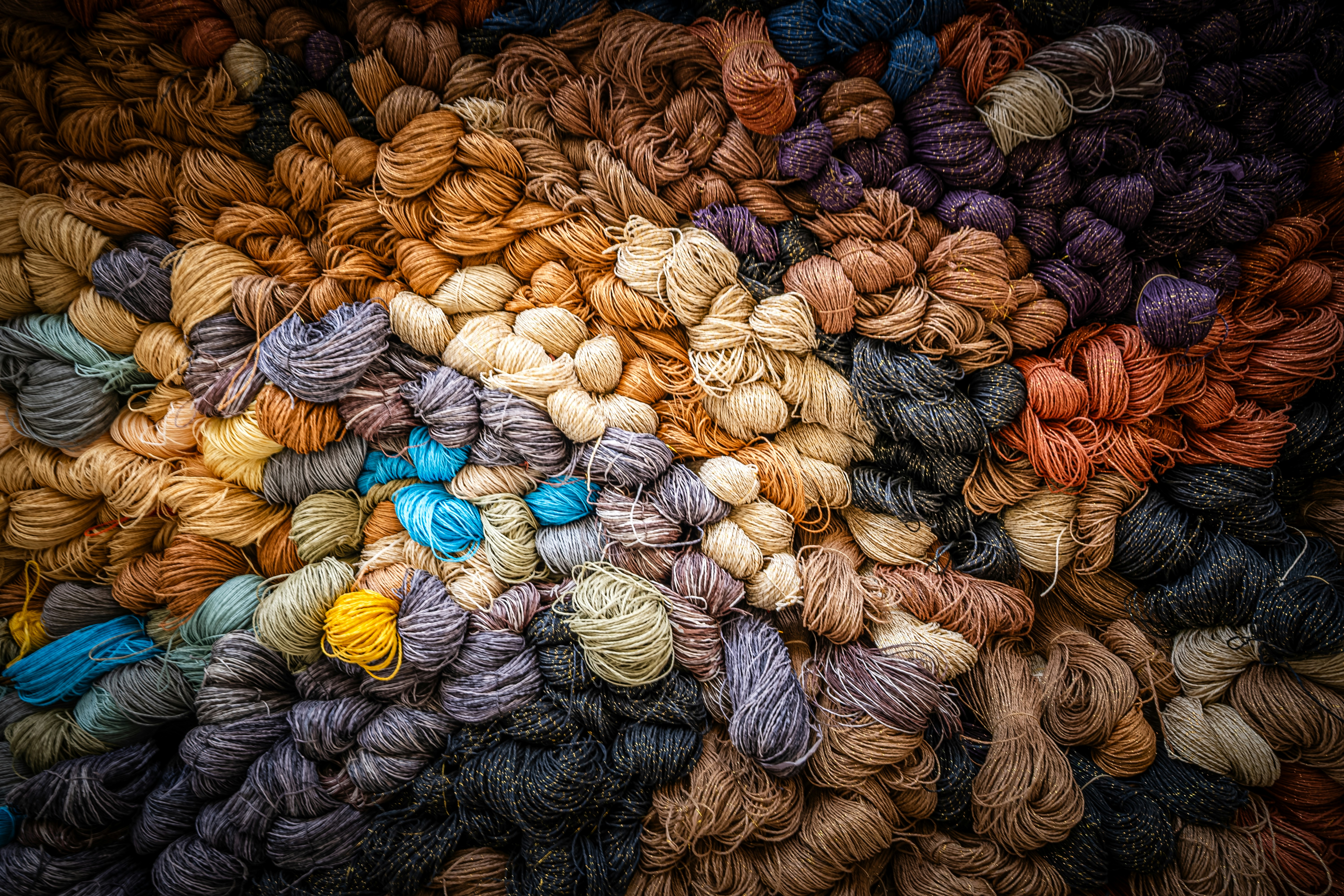 A colorful assortment of yarn bundles