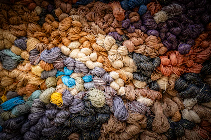 A colorful assortment of yarn bundles