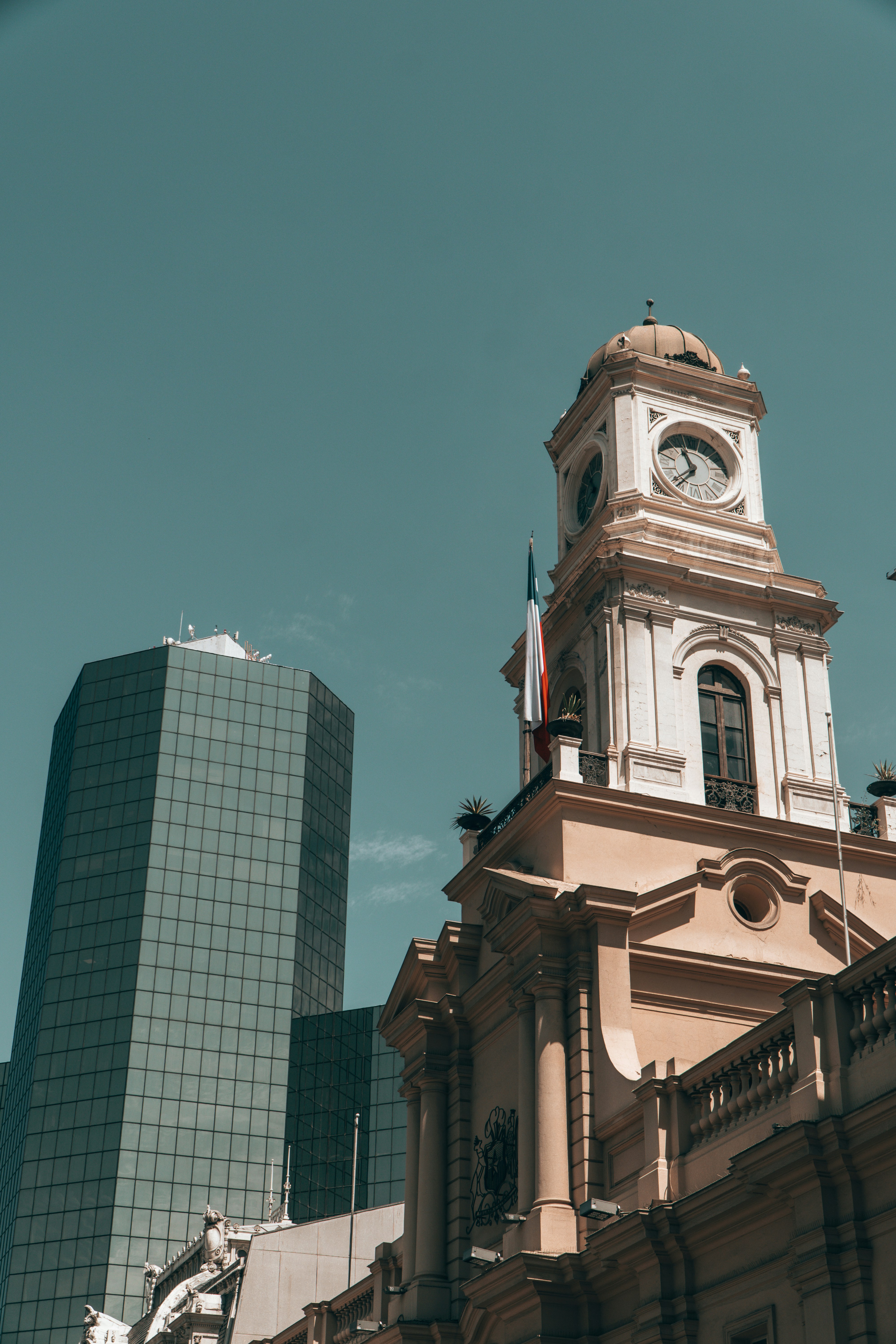 Historic building next to a modern skyscraper