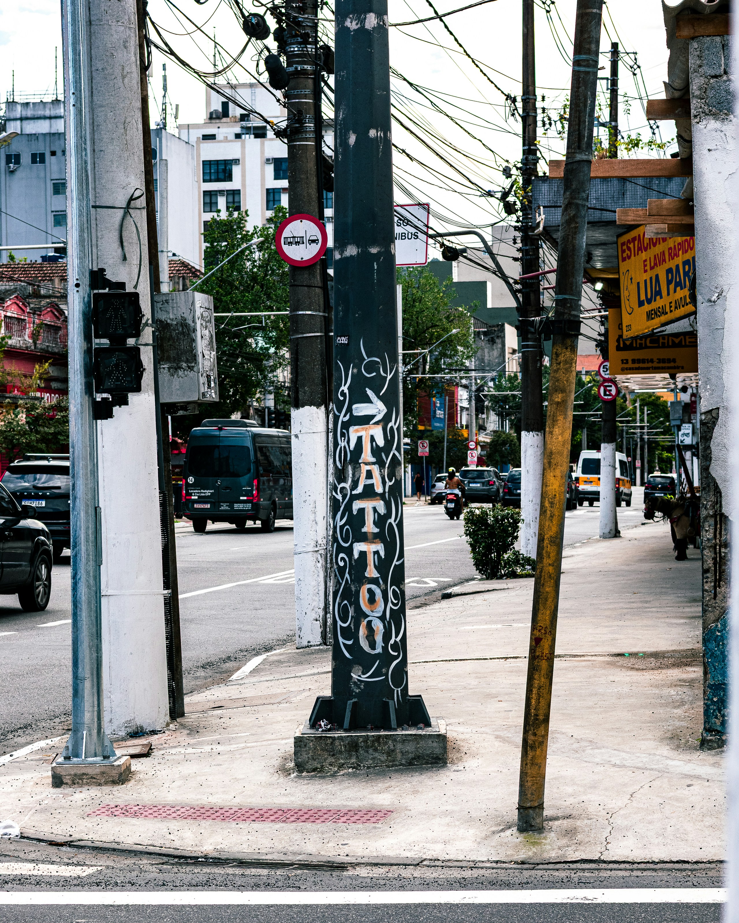 Street scene with utility poles and traffic