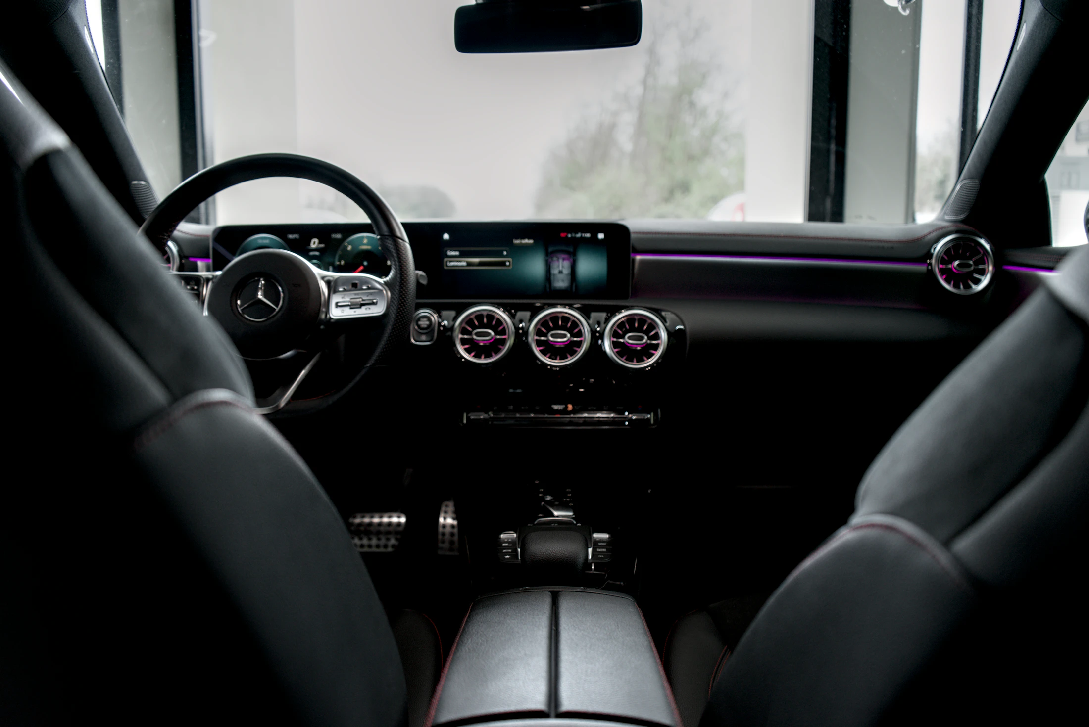 Refined modern vehicle interior with premium dashboard lighting