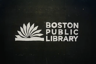 Boston public library logo on black background