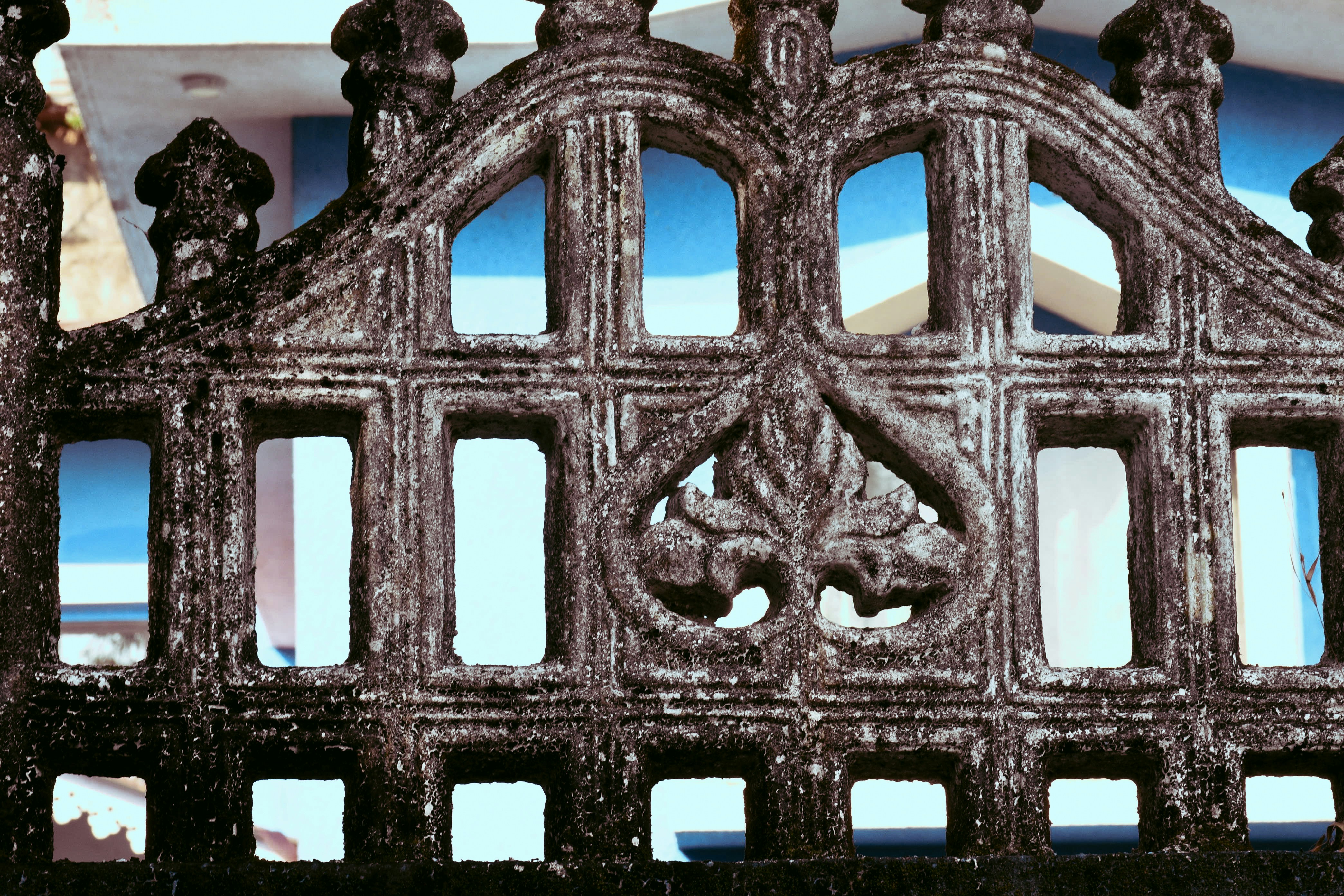 Ornate stone fence with decorative carvings