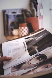 Someone reading a black and white spread